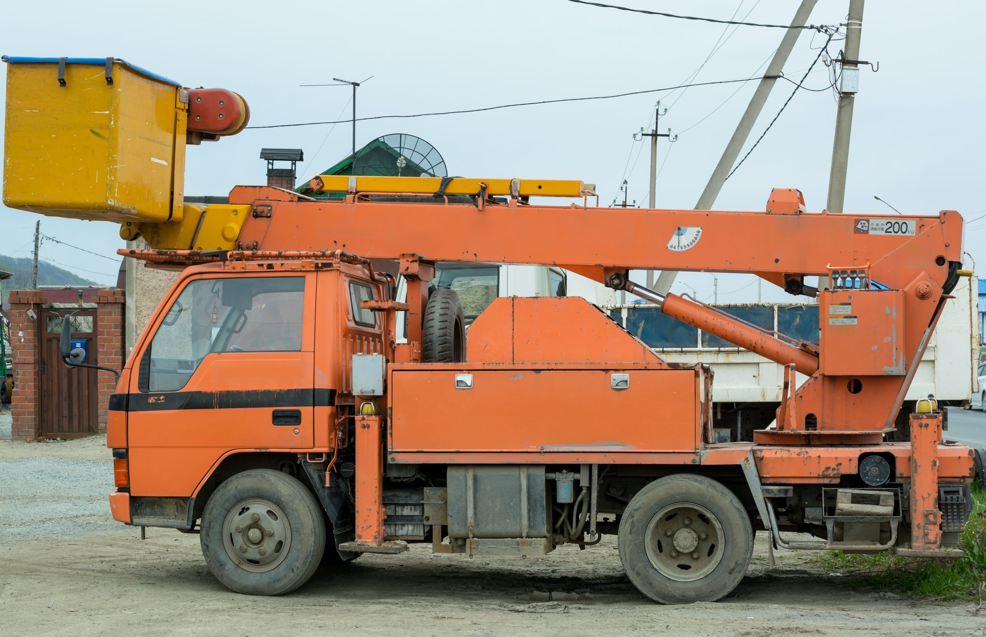 Small Truck with Hydraulic Boom.
